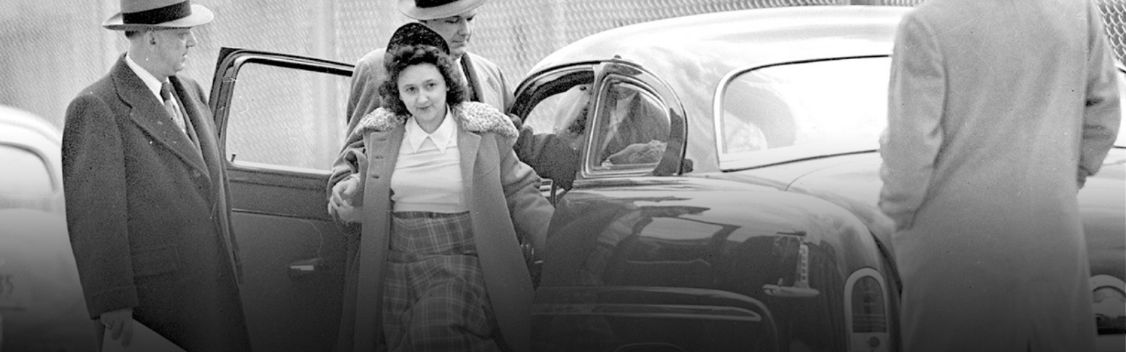 Ethel Rosenberg steps out of a vehicle